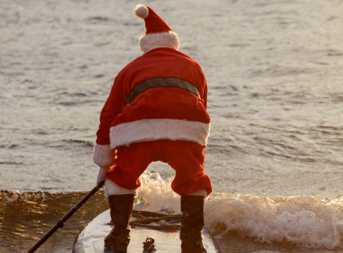 Santa on a paddleboard in Nags Head, NC