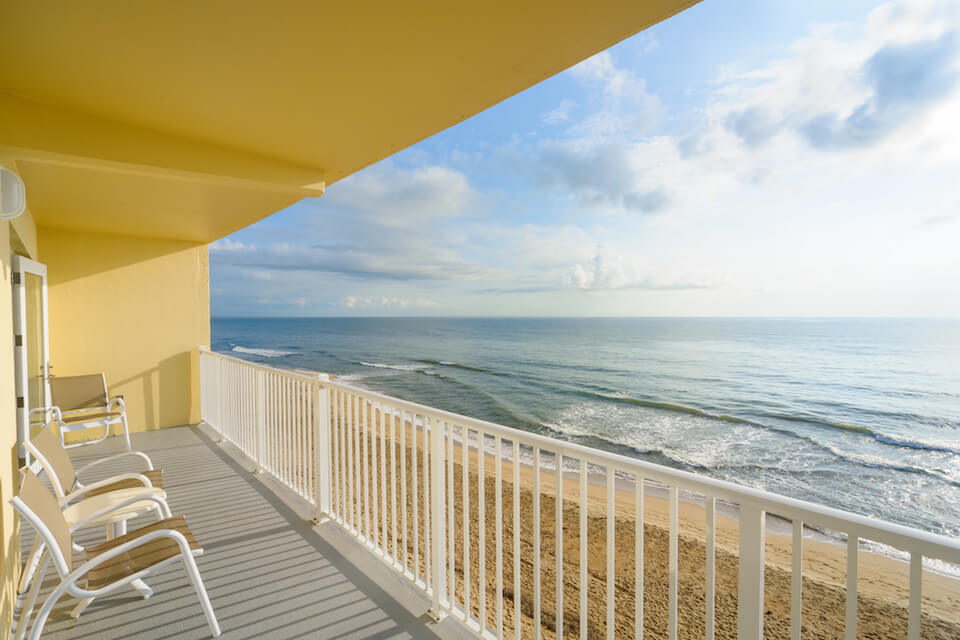 An image of a balcony and view at a resort near Kill Devil Hills sand dunes.
