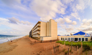 The exterior view of a hotel near Kitty Hawk Woods Coastal Reserve.