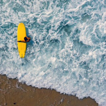 Outer Banks surfing aerial view of yellow board